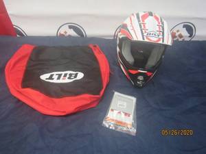 lot 47 image: NEVER USED BILT AMPED HELMET YOUTH REDWHITE WITH CLOTH CARRY BAG&nbsp