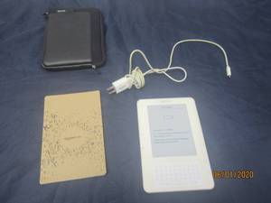 lot 217 image: AMAZON KINDLE D00701 WITH SILICONE CASE