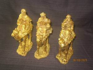 lot 430 image: THE THREE WISE MEN GOLD TABLE SCULPTURE SET EACH 9 TALL&nbsp&nbsp- THE SET FEATURES THREE HANDPAINTED GOLD MAGI , EACH RIDING A &nbsp&nbsp CAMEL&nbsp AS THEY COME BEARING SPECIAL GIFTS TO WORSHIP THE NEWBORN KING&nbsp