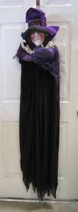 lot 33 image: Witch on a Hanger
