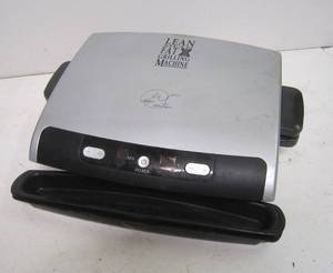 lot 66 image: George Foreman Lean Mean Fat Reducing Grilling Machine