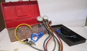 lot 121 image: Freon gauges in tool box