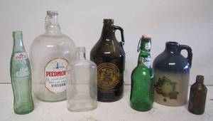 lot 140 image: Jugs and bottle