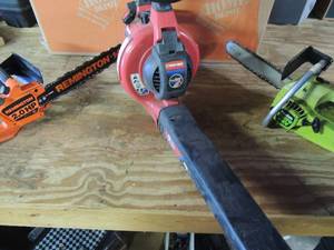 lot 521 image: Remington 2 HP chainsaw 14 blade-electric Poulin micro XXX 12 blade gas powered troy built 31cc 425 cfm 2 cycl3 temp gas mix powered