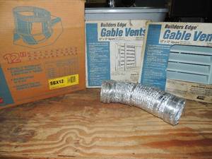lot 483 image: Turbine base in box (used) 4 boxes of Gable vents 12 x 12 square NEW, 1 dryer vent hose