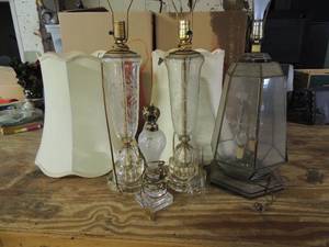lot 485 image: 2 clear glass side table lamps 14 tall with shades,  small oil like lamp needs repair has glass globe cover