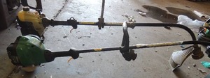 lot 558 image: feather lite FX 265 15 cut round weed eater with string protector