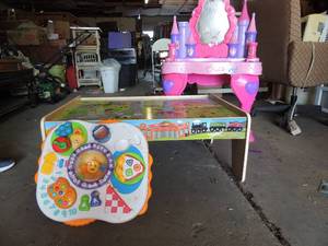 lot 562 image: Little girl makeup table with mirror Disney Cinderella small wooden play table for kids and toddler learning ABC 123 pad