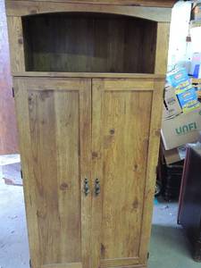 lot 584 image: Light brown hide a desk 58x34 x22 deep top open shelf double doors roll out keyboard shelf