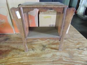 lot 587 image: Wooden side table with magazine slots on each side  OR  a telephone table  23x23X 11deep