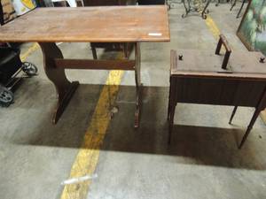 lot 608 image: Small square kitchen table scratches on top needs sanding 30x43x27 high, table with handle 2 side top door storage space middle handle needs to be fixed 23x21x12