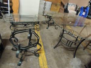 lot 609 image: Set of 2 indooroutdoor end tables 21 high x 25 x25 and coffee table 17 high 45 long 24 width. Glass top on one end table missing glass and large glass top oval table with black metal frame 30 highx45