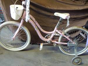 lot 541 image: Pink Mystic girls bike with training wheels,   Disney frozen bike with training wheels and girls princess bike needs tire repair
