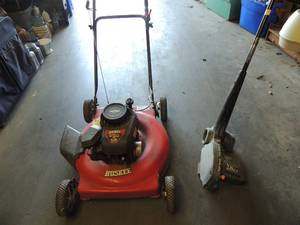 lot 552 image: Black n Decker electric edger and Huskee 5.0 gas power mower