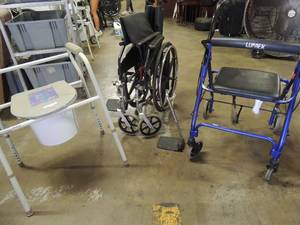 lot 640 image: Lunex 4 wheeled walker with padded seat and brake, black metro wheel chair Almex potty chair