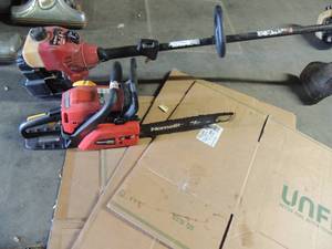 lot 657 image: Homelite 3450cc red chainsaw  and yard machine 2899m weed eater red All unknown working condition