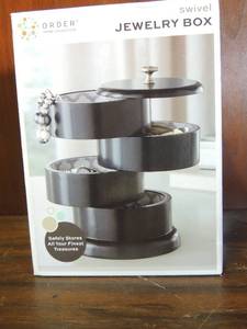 lot 673 image: Swivel jewlery box NIB has 4 slots for jewlery
