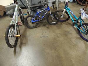lot 677 image: ToPae Magna Terquico Bicycle needs tires fixed Clutch Magna boys bike, white and green bike pegs on front and back (its been spray painted)