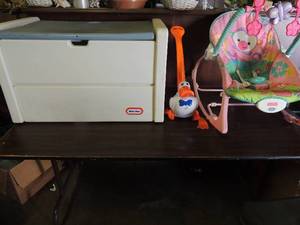 lot 729 image: Pink and purple money baby swing Fisher price, Fisher price walking duck and large fisher price toy bin