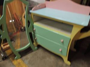 lot 746 image: Multicolor  2 drawer childs dresser 47hx 26 wide with crayon shaped mirror 47h x 39w