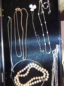 lot 754 image: Necklaces- gold  chains, pink pearl necklace with matching bracelet,  Faux pearl necklace  quantity 7