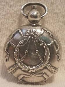 lot 84 image: RARE FIND ANTIQUE STERLING SILVER CHATELAINE PENDANT COIN HOLDER (CIRCA 1900S)