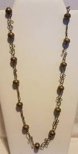 lot 105 image: VINTAGE BRASS NECKLACE