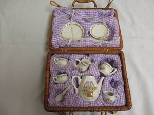 lot 13 image: Childerns  Porcelain Picnic  Tea Set In Wicker Case.