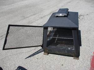 lot 7 image: OUT DOOR METAL FIRE PIT  GRILL.