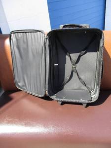 lot 19 image: Pull behind Travel Suitcase