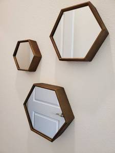 lot 51 image: Three Hexagon Shaped Wall Mirrors