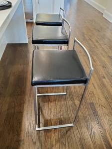 lot 124 image: Three Black Faux Leather & Metal Bar Stools