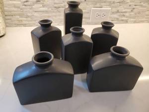 lot 152 image: Group of Matte Black Ceramic Vases