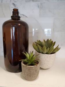 lot 186 image: Brown Jug with 2 Faux Succulents
