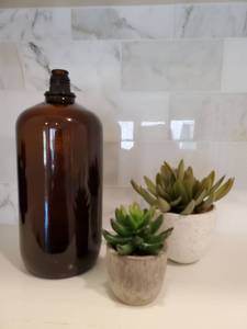 lot 187 image: Brown Jug with 2 Faux Succulents