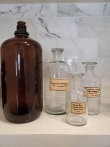 lot 190 image: Brown Jug with Vintage Look Bottles