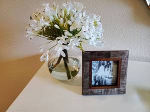lot 194 image: Twos Company Frame with Faux Flowers