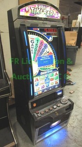 lot 1 image: Bally Alpha V32 cash spin with MEI bill acceptor Slicks Tiki bar slot machine