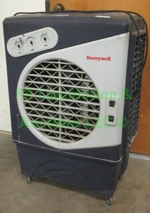 lot 3 image: Honeywell model CO60PM evaporative air cooler