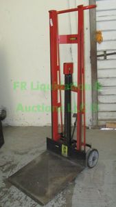 lot 78 image: Wesco model PL-54-2222 foot pedal platform lift truck four wheel style 750 Lb. cap.