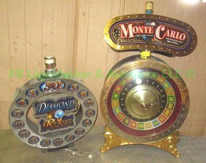 lot 211 image: Diamond ring & Monte Carlo roulette wheel (top piece broken off) slot machine toppers