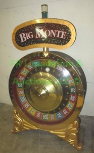 lot 215 image: Big Monte roulette wheel slot machine topper