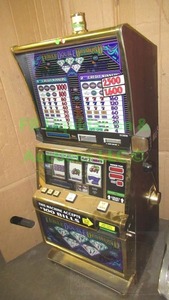 lot 232 image: One armed bandit Triple Double Diamond slot machine