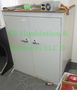 lot 243 image: Double door metal storage cabinet