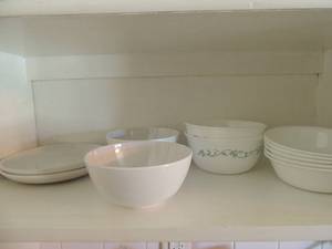 lot 21 image: Correlle bowls x 2 with green leaves    Bowls x 5 white,    Better Homes and garden bowls x 2 and two 6 plates