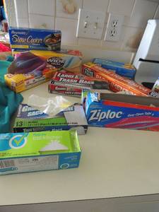 lot 30 image: Lot of storage bags, preopened all sizes, Parchment paper, and trash bags
