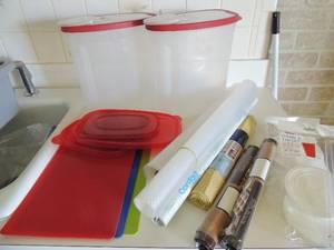 lot 43 image: 2 storage containers, silicone mats, new straw and lid sets, silicone baking mats x 2 new, and shelf liners