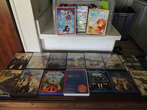lot 72 image: Large lot of DVDs includes frozen, lion king 2, monsters Ink, Mall cop  an many more