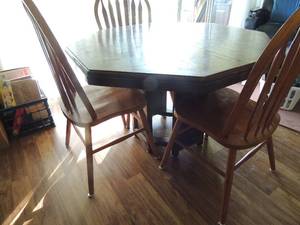 lot 10 image: Dark Oak Parquet  Wood Dining Table  has  one leaf  and 3 chairs,