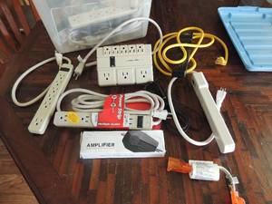 lot 82 image: TV amplifier NIB, new and used extension cords and outlets plugs and many more items